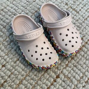 CROCS Kids Slip-On Clogs in Pale Pink with Multicolor Beaded Trim